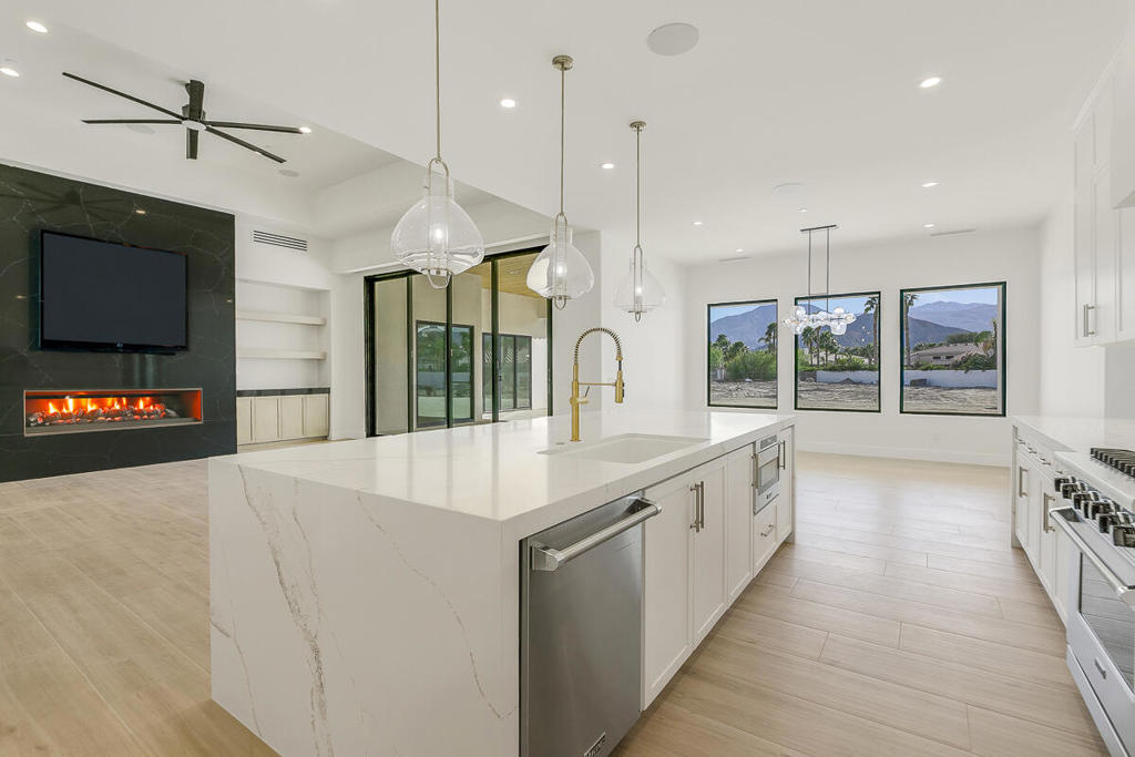 Price improvement! Two newly built residences totaling 7,805+/- SF on 1.64+/- acres deliver luxury, privacy, and income potential on a quiet cul-de-sac.Residence One (3,348 SF): Features 3 en-suite bedrooms + office, 14' ceilings, striking 8' quartz fireplace, chef's kitchen with Viking appliances, and 14' stacking glass doors to a 74' covered patio with integrated sound. 3-car insulated garage and a bonus outdoor room add everyday flexibility.Residence Two (4,458 SF): Features 4 en-suite bedrooms, game room, office, powder room, grand great room with 16' ceilings, and an 18' pocket door that blurs indoor/outdoor living. Viking appliances, porcelain tile throughout, whole-home sound, plus an outdoor shower and pool bath--ready for your resort-style pool.Four versatile flex rooms across both homes accommodate a gym, studio, theater, or additional sleeping (potential for ~11 sleeping areas). Expansive, usable grounds offer space for a pool, pickleball, sport court, and an outdoor kitchen. Live multi-gen, entertain in style, or pursue STR income . A modern compound built for comfort, and cash flow--now at a compelling new price.