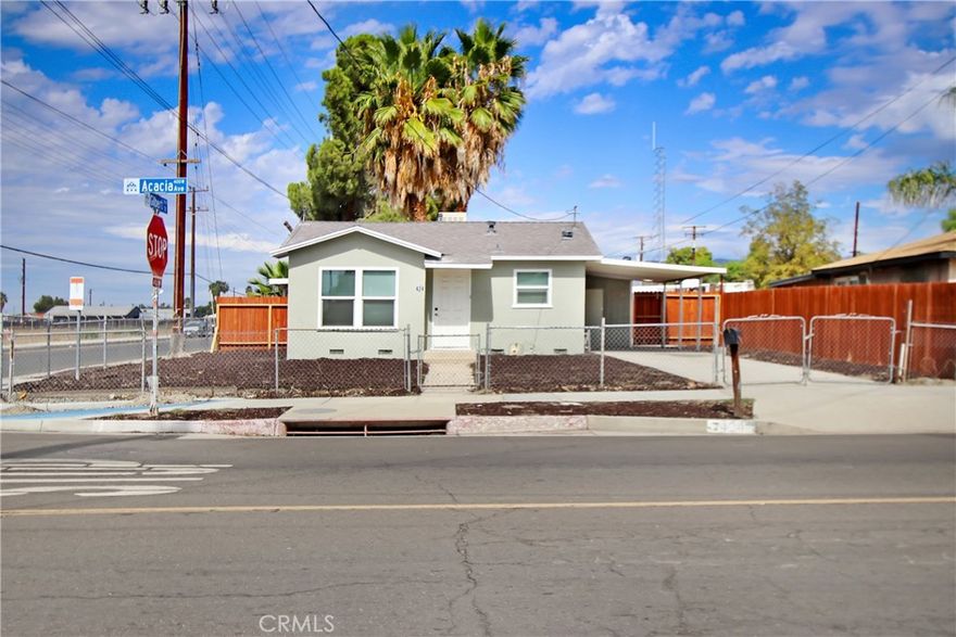 Welcome home to this charming single-family property with a versatile secondary unit—ideal for multigenerational living, guests, or extra income potential! The main home (1 bed/1 bath, approx. 500 sqft, ) shines with new paint, updated flooring, quartz counters, dual pane windows, and modern finishes. The separate unit (1 bed/1 bath, approx. 400 sq ft,) offers a beautifully remodeled kitchen with quartz countertops, tile backsplash, and stainless steel appliances plus an updated bath and mini-split AC. Enjoy a large corner lot with gated rear access, carport, driveway parking, shared laundry hookups, private patio, and fenced yard. Endless possibilities for home-based business, storage, or future ADU expansion (buyer to verify).