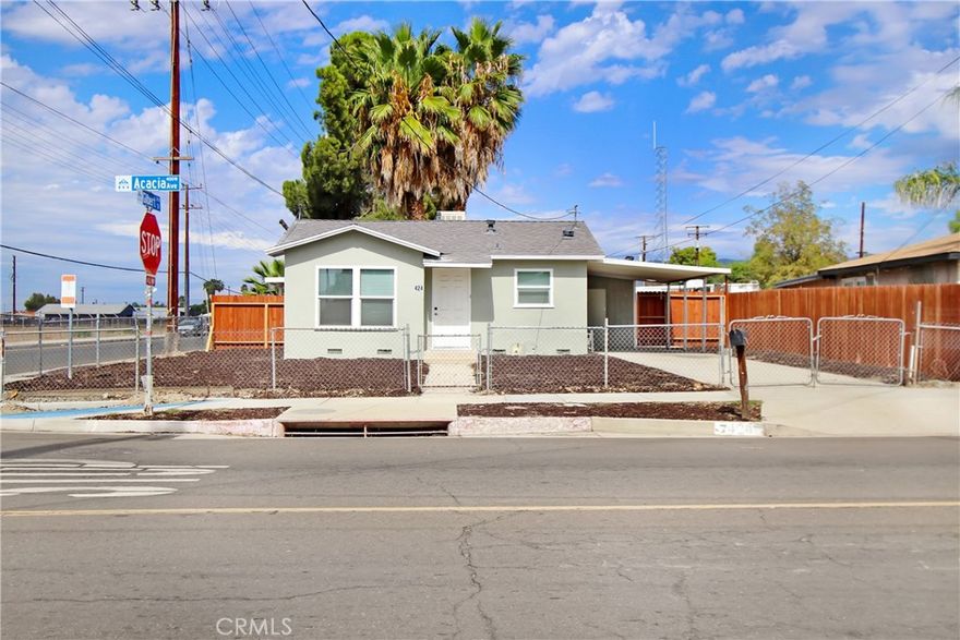 Welcome home to this charming single-family property with a versatile secondary unit—ideal for multigenerational living, guests, or extra income potential! The main home (1 bed/1 bath, approx. 500 sqft, ) shines with new paint, updated flooring, quartz counters, dual pane windows, and modern finishes. The separate unit (1 bed/1 bath, approx. 400 sq ft,) offers a beautifully remodeled kitchen with quartz countertops, tile backsplash, and stainless steel appliances plus an updated bath and mini-split AC. Enjoy a large corner lot with gated rear access, carport, driveway parking, shared laundry hookups, private patio, and fenced yard. Endless possibilities for home-based business, storage, or future ADU expansion (buyer to verify).