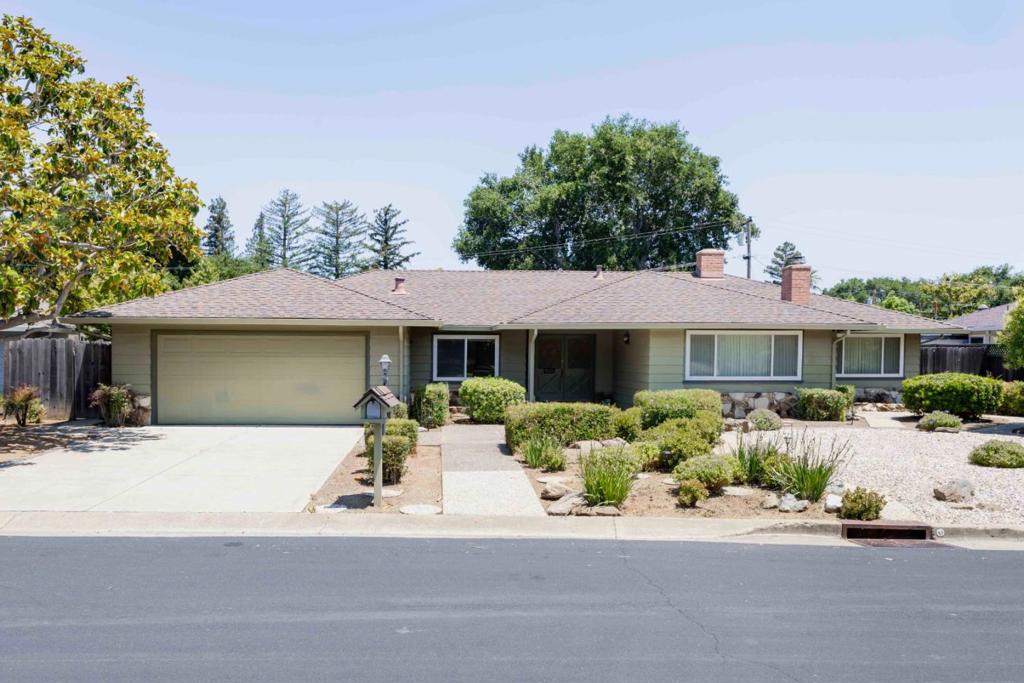 Tucked away on a peaceful cul-de-sac in North Los Altos, this inviting home rests on over a quarter acre of land and enjoys an unbeatable location just minutes from the shops and restaurants of downtown. Warm hardwood floors and abundant natural light create a welcoming ambiance throughout, complementing a traditional floorplan that features a spacious living room with a fireplace, a dining room, an eat-in kitchen, and four well-sized bedrooms, including a generous primary suite. The private backyard offers a peaceful setting with ample space to relax or entertain. Enjoy easy access to nearby parks, major commute routes, and top-ranked schools including Gardner Bullis Elementary, Egan Junior High, and Los Altos High (buyer to verify eligibility).