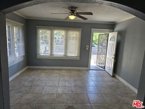 Photo of 4211 Halldale Avenue, Los Angeles, CA 90062 (MLS # 25630629)