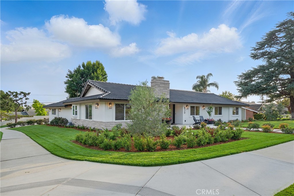 Seller will carry at 5.0% interest, subject to agreeable terms and conditions. Stunningly Remodeled Luxury Home in Glendora. Step into a world of elegance and modern sophistication with this exquisitely reimagined home, boasting an extensive remodel and custom floor plan reconfiguration. The seller has invested over $800,000 into the home, ensuring every detail is meticulously crafted to blend style and functionality, making this property a true masterpiece. Inside, you’ll find new Paradigm Performer Plus waterproof plank flooring throughout, creating a seamless and refined ambiance. The bathrooms feature elegant new porcelain tile, adding a touch of luxury to everyday living. The completely remodeled kitchen showcases custom cabinetry, quartz countertops, a stunning tile backsplash, and an oversized island with a built-in drawer-style microwave. High-end appliances, including a Thor 6-burner range, wall-mounted range hood, LG dishwasher, and Samsung smart refrigerator with beverage zone, elevate both form and function. Adjacent, a stylish coffee bar area mirrors the kitchen’s refined finishes with custom cabinetry, quartz countertops, and tile backsplash. The fully remodeled bathrooms feature new toilets, sinks, custom tile work, backlit mirrors, and sleek new shower glass, with the primary bathroom boasting a freestanding soaking tub for an indulgent spa-like retreat. The luxury continues with a brand-new laundry room, equipped with custom cabinetry and an LG tower stackable washer and dryer. Entertain effortlessly with a new bar station off the living room, complete with custom cabinetry and an in-bar wine and beverage center, perfect for hosting guests. Every inch of the interior has been upgraded with new 5H drywall and a level 5 skim coat, along with enhanced insulation in the walls, foundation, and ceiling (R30-rated ceiling insulation), ensuring maximum comfort and energy efficiency. Sophisticated new doors and hardware add a refined touch, while expansive 15-foot sliding glass doors seamlessly connect indoor and outdoor living, opening up to a stunning backyard oasis. This extraordinary home is the perfect blend of contemporary luxury and thoughtful design—don't miss the opportunity to make it yours.