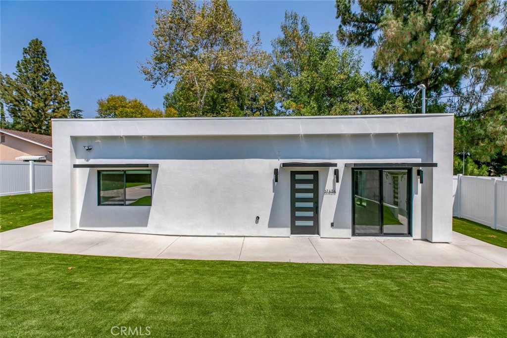 Welcome to your dream New Construction ADU! Tucked away in one of Granada Hills’ most desirable neighborhoods, this newly built 3-bedroom, 2-bath accessory dwelling unit offers modern comfort and privacy. Step inside to soaring high ceilings and an open-concept layout that fills the space with natural light. The sleek, gorgeous kitchen features quartz countertops, soft-close cabinetry, and stainless steel appliances, The primary suite has it's own beautifully appointed ensuite bathroom. Enjoy indoor-outdoor living with your own private large patio—ideal for morning coffee, weekend barbecues, or d relaxing. You will love the fully PAID-OFF SOLAR system, helping you save on utilities, dual-pane windows, modern curtains, recessed lighting, in-unit laundry hookups! gated side entrance provides privacy, additionally enjoy access to a shared pool just steps away a perfect bonus for warm California days. Conveniently located near top-rated schools, shopping, dining, parks, and easy freeway access. This is a must see!