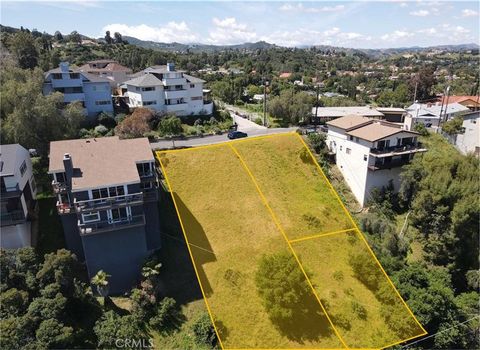 Photo of 21478 Iglesia Drive, Woodland Hills, CA 91364 (MLS # SR26087702)