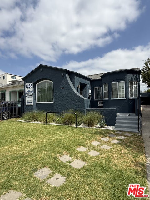 Photo of 1283 W 36th Street, Los Angeles, CA 90007 (MLS # 26849769)