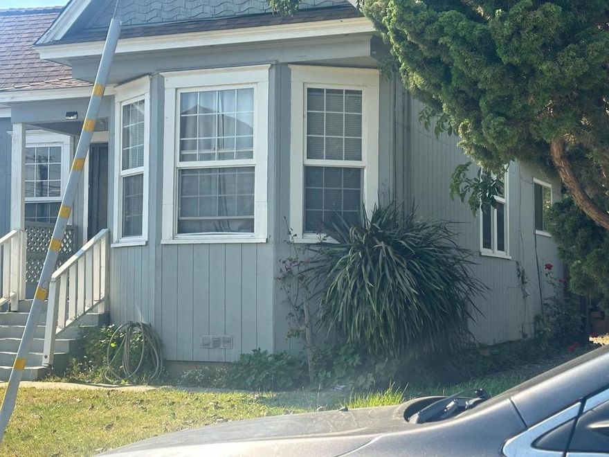 Welcome to this charming home located in the heart of Watsonville. This cozy property offers 968 square feet of living space, featuring 2 bedrooms and 1.5 bathroom. Additional amenities include high ceilings that enhance the spaciousness of the rooms. The exterior offers a minimum lot size of 6,752 square feet,Great for ADU's along with a convenient 2-car garage. For families, the property falls within the Pajaro Valley Unified Elementary School District, providing educational options in the area. Needs Work