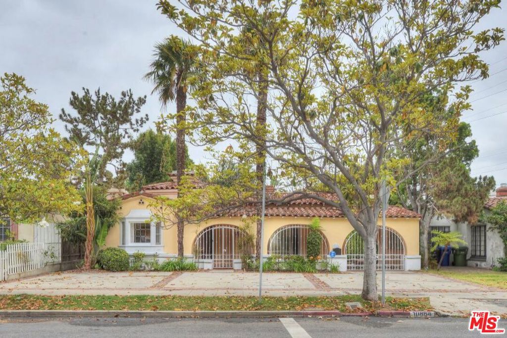 Welcome to this beautifully preserved and lovingly updated Spanish-style home located in one of West LA's most desirable neighborhoods. Welcome to this beautifully maintained and character-rich Spanish-style home, ideally located in the heart of Westwood. Featuring 3 bedrooms, 2 bathrooms, plus a detached guest house with a kitchenette and bath, this property offers the perfect blend of timeless charm, flexible living space, and modern convenience. Step inside to find rich hardwood floors throughout and an abundance of natural light from thoughtfully placed skylights. The home features central heat and air with a Nest thermostat to keep you comfortable year-round. Four decorative fireplaces in the primary suite, second bedroom, living room, and dining room add warmth and elegance to every corner. French doors off the main living areas lead to a private, lush backyard oasis complete with mature landscaping and ample space to relax or entertain, with three off-street parking spaces. Did we mention the detached guest house, ideal for visitors, a home office, or a den?! Located within close proximity to UCLA, Westwood Village, movie theaters, restaurants, and more! This home offers unbeatable access to everything West LA has to offer, all while enjoying peace and privacy at home. A true gem that combines classic beauty with today's lifestyle needs.
