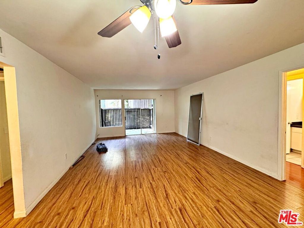 Photo of 18350 Hatteras Street #152, Tarzana, CA 91356 (MLS # 26833391)