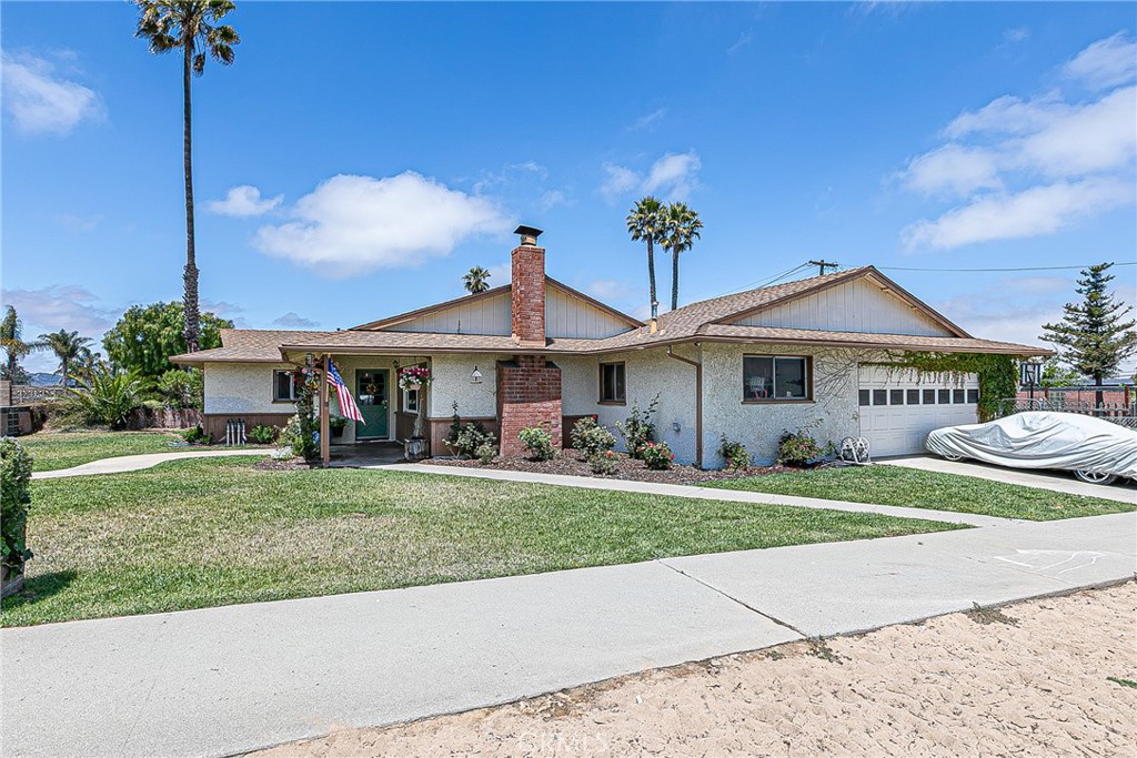 This bright and cheerful 3-bedroom, 2-bath home in the heart of Orcutt features an open floor plan and a spacious kitchen—perfect for family gatherings and entertaining. The home is filled with natural light, highlighted by a huge front window overlooking the beautifully maintained front yard. Enjoy the comfort of newer Luxury Vinyl Plank flooring and fresh interior paint through some of the home. A bonus structure offers the perfect space for a home office, art studio, workshop, or whatever suits your lifestyle. The expansive backyard is a true highlight—offering RV parking, room for a possible ADU, garden beds, or 4H projects. Mature fruit trees add charm and provide fresh seasonal produce. Located near Orcutt schools, parks, and shopping, this home combines convenience with endless potential.