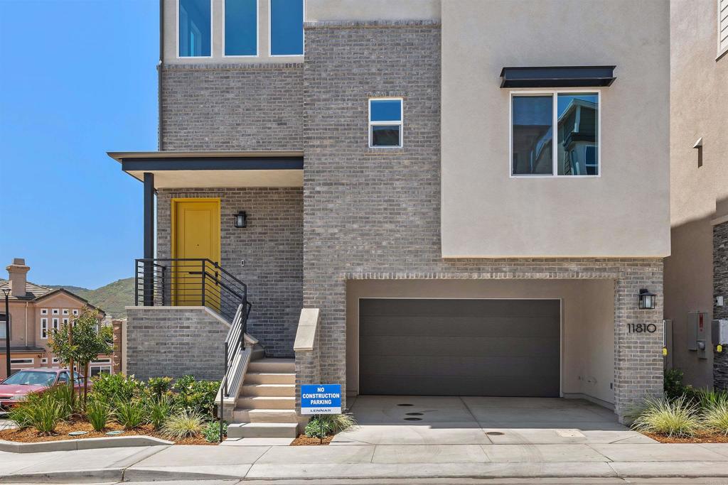 Welcome to this brand-new home in the highly desirable Carmel Mountain Ranch neighborhood! This stunning four-bedroom, four-bath home boasts a popular floor plan, complete with a loft flooded with abundant sunlight. Enjoy the two patios, each offering beautiful mountain views. The first level boasts a bedroom and a full shower, perfect for convenience. Abundant sunlight fills every room, and breathtaking mountain views await you from both indoors and the outdoor patio. Step into the spacious kitchen with quartz countertops, stainless steel appliances, an island, and ample counter space. The seamless flow between the kitchen and family rooms creates a large, open space perfect for entertaining. Imagine relaxing on the oversized patio, seamlessly extending your living area outdoors. Upstairs, you'll find a full-size laundry room complete with a sink for added convenience. The master bedroom is generously sized and features a delightful patio with stunning views. The master bathroom includes both a shower and a tub, along with a dual walk-in closet. Additionally, there's a kids' bedroom with an upgraded bathroom and an open loft area that offers plenty of scenic views Comes with a two-car attached garage, providing extra storage space. Additionally, there's an additional two-car carport, ensuring a total of four reserved parking spots. This home comes equipped with solar panels, a battery backup system, and even an electric car charger. Conveniently located just steps away from multiple parks, schools, the library, and shopping, this home is a must-see!