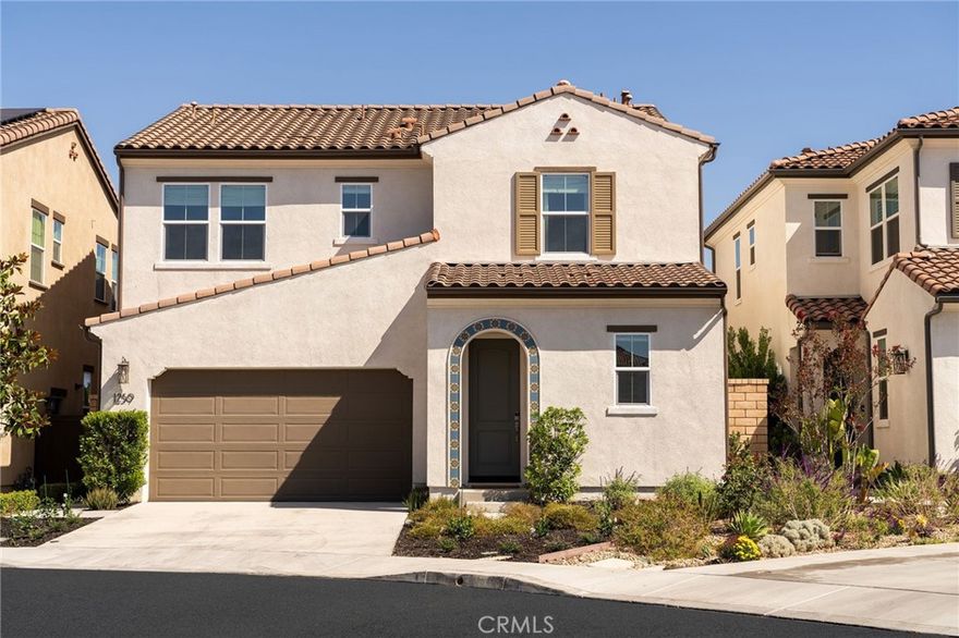 Welcome to this breathtaking 4-bedroom, 3-bathroom home built in 2021, where modern design meets everyday comfort. From the moment you step inside, you’ll notice the meticulous attention to detail and premium upgrades that make this home truly one of a kind.



The chef-inspired kitchen boasts sleek GE appliances, an upgraded vent hood, granite counters, and a filtered water faucet, all designed for both style and function. A smart home system with Ring door camera, built-in Wi-Fi extenders, and solar panels keeps life connected and efficient, while the downstairs guest bedroom offers flexibility for visitors or multi-generational living.



Step outside to your own tropical retreat. The spacious backyard features premium turf, lush landscaping, and a timed irrigation system. Gather in the California room with its cozy fireplace and outdoor TV setup, perfect for entertaining year-round.



The two-car garage is fully finished with epoxy flooring, ample built-in storage, and 240v wiring ready for your EV charger. Additional upgrades include a whole-home water softener and energy-efficient systems throughout.



All this in a private gated community near top-rated schools, shopping, dining, and everyday conveniences even a grocery store within walking distance.



This home truly has it all! Luxury, efficiency, and comfort wrapped into one incredible package.