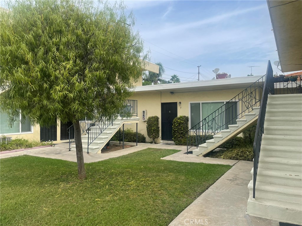 Turnkey, ground-level 2BR/1BA in north Fullerton—Unit 7 at 701 N Adlena (Also referred to as 1801 Malvern). No one above. Bright living/dining area opens to a refreshed kitchen with range, dishwasher, and microwave. Easy-care tile floors throughout; wall A/C and wall heater for year-round comfort. Two well-sized bedrooms with ample closets and a clean full bath. Community features include a landscaped courtyard and on-site coin laundry. Parking made easy with a detached 1-car garage + driveway space in front of the garage. Water included. Close to parks, schools, and shopping. Nearby schools include Fern Drive Elementary, Parks Junior High, and Sunny Hills High School (tenant to verify). $2,500/mo, $1,500 deposit, 1-year lease, available now. All info deemed reliable but not guaranteed; tenant to verify.