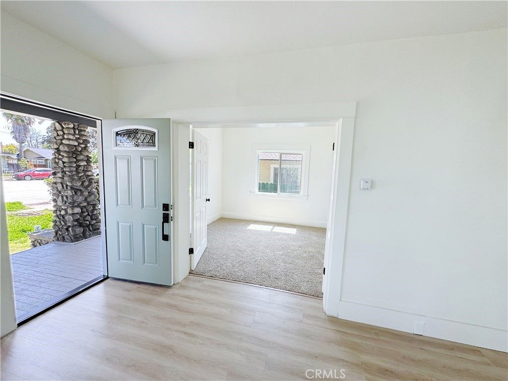 Photo of 873 N Towne Ave, Pomona, CA 91767 (MLS # DW25241283)