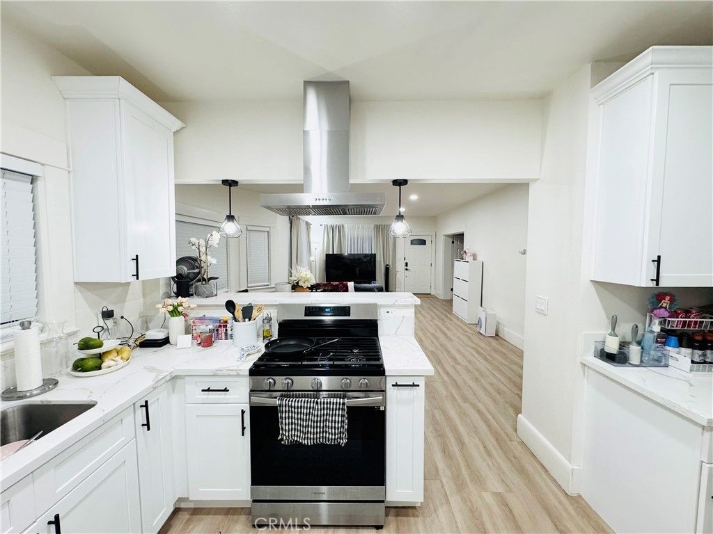 Photo of 873 N Towne Ave, Pomona, CA 91767 (MLS # DW25241283)