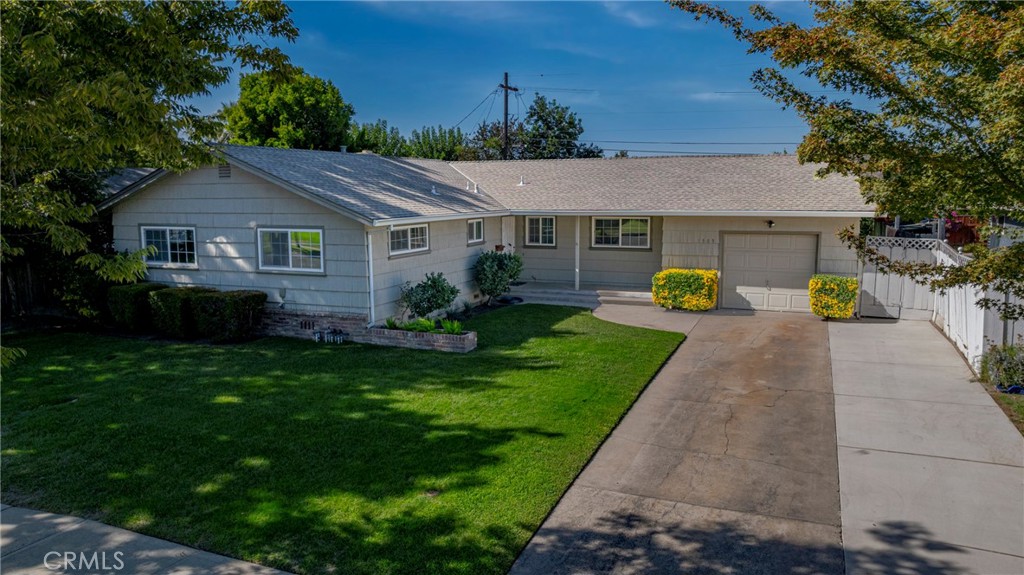 Charming 3-bedroom, 2 bath home built in 1955 with 1,640 sq. ft. of living space. Situated on a larger lot, this property offers plenty of room to enjoy both indoors and outdoors. A new roof was put on in November of 2024. Some of the home features include double pane windows, covered patio, new interior paint, original hardwood flooring, and more. The home maintains its classic character while providing important upgrades, making it a great opportunity for a first-time buyer, investor, or anyone looking for extra space in a desirable location.