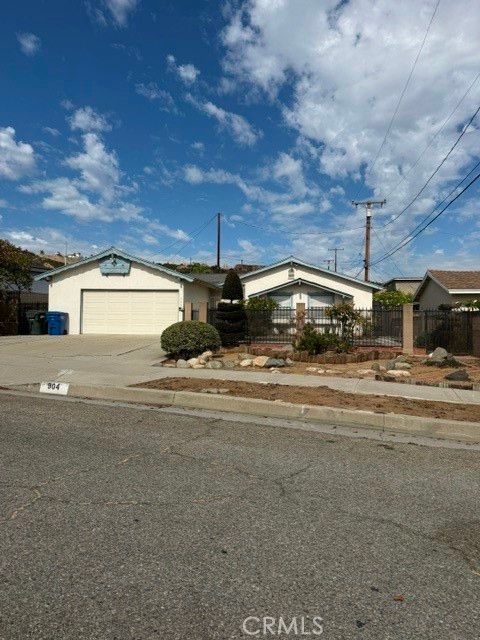 Photo of 904 N Azalea Drive, Montebello, CA 90640 (MLS # MB26102328)