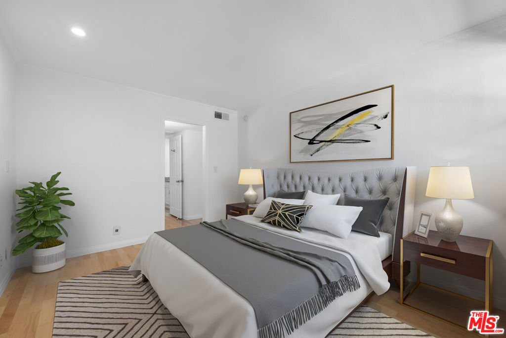Live your best LA life in this bright West Hollywood condo with your own underground parking spot, abundant guest parking, and EV/Tesla charging stations, you're totally set! Or leave the car behind and enjoy one of the most walkable neighborhoods in the city. Nestled between the buzz of Santa Monica Blvd and the trendsetting energy of Melrose Ave, you're just steps from Gelson's, Whole Foods, cozy cafes, and designer boutiques. Inside, this spacious, light-filled unit features natural hardwood floors, marble tile, crown molding, and recessed lighting throughout. The oversized walk-in closet is ready for your dream wardrobe, and a generous patio spans the entire length of the unit ideal for relaxing or entertaining. Modern conveniences include a smart building access system with touchscreen entry and phone notifications for guests. Kings Villas offers top-tier amenities: two bubbling spas, a billiards room, fitness center, sauna, secure package/mail area, bike storage, and a rooftop deck with panoramic city and hillside views, plus a BBQ area. Laundry is conveniently located on the same floor, and high-speed internet is included in rent. Also available for sale for $499,000.