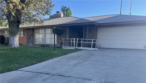Photo of 323 E Holly Street, Rialto, CA 92376 (MLS # CV26030717)