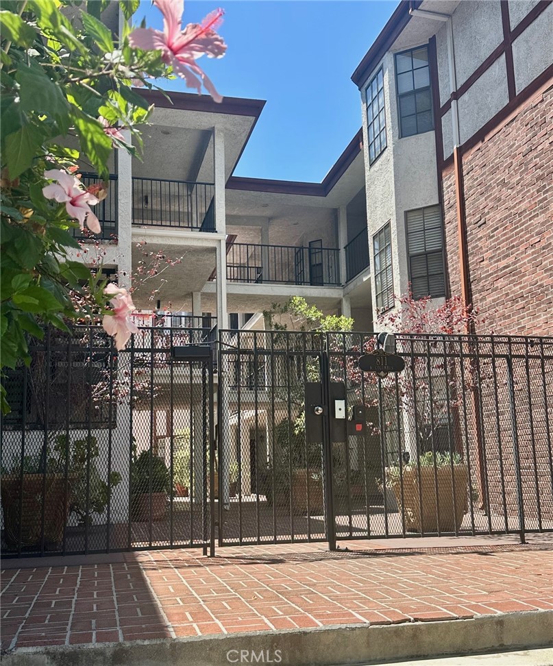Charming Condo in Prime Glendale Location. Welcome to Unit 18 at 811 N. Columbus Avenue—a beautifully maintained condo in the heart of one of Glendale’s most desirable neighborhoods. This light-filled corner unit offers a perfect blend of comfort, style, and convenience, making it an ideal home for first-time buyers, downsizers, or savvy investors. Step inside to find a thoughtfully designed layout featuring 2 spacious bedrooms and 2 bathrooms, a bright living area, and a private balcony perfect for enjoying your morning coffee or evening breeze. The kitchen offers ample cabinetry and counter space, ready for your personal touches. Located in a well-kept and quiet complex, this unit includes central air/heat, in-unit laundry with washer /dryer included and assigned parking. Situated near the heart of Glendale, you're just minutes from The Americana at Brand, the Galleria, Whole Foods, dining, parks, and easy freeway access to Downtown LA, Burbank, and Pasadena.