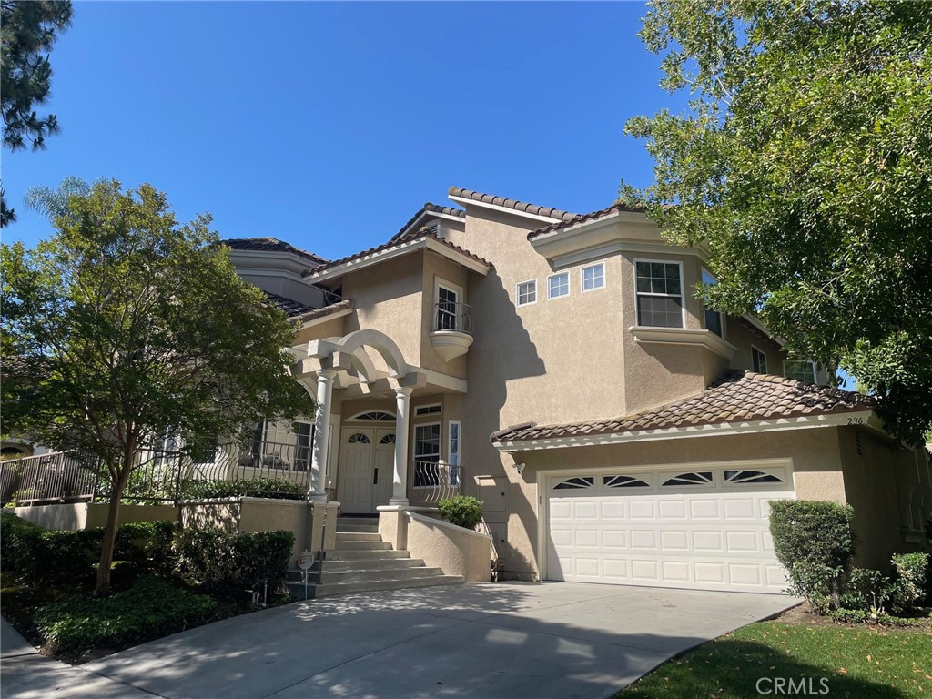 Welcome to this beautiful and charming home on a quiet cul-de-sac in the prestigious Via Verde neighborhood of San Dimas! This spacious two-story residence features 4 bedrooms and 3 bathrooms, including a convenient bedroom downstairs for guests or family visiting. A high cathedral ceiling welcomes you into a large and luminous living room, with a warm gas fireplace. The kitchen next to the family room, boasts stainless steel appliances, white cabinets, quartz countertops and a breakfast counter. The master bedroom upstairs offers a high ceiling, a double doors entry and a large walk-in closet. The master bath invites pure relaxation with a jacuzzi but and double sinks. There are also two large bedrooms with a full bathroom upstairs. One of the bedrooms has a custom built office. An upstairs loft overlooks the living room and dining area below. The home includes a large 2-car attached garage with high ceilings. The HOA covers the exterior: structure, stucco, paint, roof and front landscaping/irrigation repairs and homeowner insurance. This home is located in a quiet and peaceful community. You will enjoy the tranquility of the neighborhood and leisurely walks along the nearby trails. Within a short distance to Puddingstone Lake/Bonelli Park, Via Verde Country Club, Raging Waters, hiking, biking, horse trails, and Cal Poly University. This property provides a comfortable and serene home nestled in a prestigious community. Near fwy 57, 10, 71. This is a rare opportunity to make Via Verde your home.