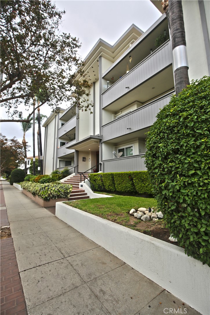 This spacious one-bedroom, one-bathroom condo offers comfortable living with a large private enclosed patio, perfect for relaxing or entertaining. A generous coat closet sits conveniently next to the front door. The open-concept living and dining area flows seamlessly through sliding glass doors to the outdoor patio, creating an inviting indoor-outdoor connection. The remodeled, efficient kitchen features granite countertops and newer appliances. The large bedroom includes a walk-in closet, while the updated bathroom showcases a modern tile shower and a stylish vanity. Split HVAC units are available in the living room and bedroom. Wood flooring and recessed lighting extend throughout the entire unit, adding warmth and contemporary charm. Additional features include one assigned parking space with a storage area in the gated garage, and a community laundry room easily accessible by elevator or stairs. Ideally located near the South Lake Avenue shopping district and Old Town Pasadena, this home is also within walking distance to Pasadena City College and Caltech, offering both convenience and a vibrant urban lifestyle. Move-in ready.