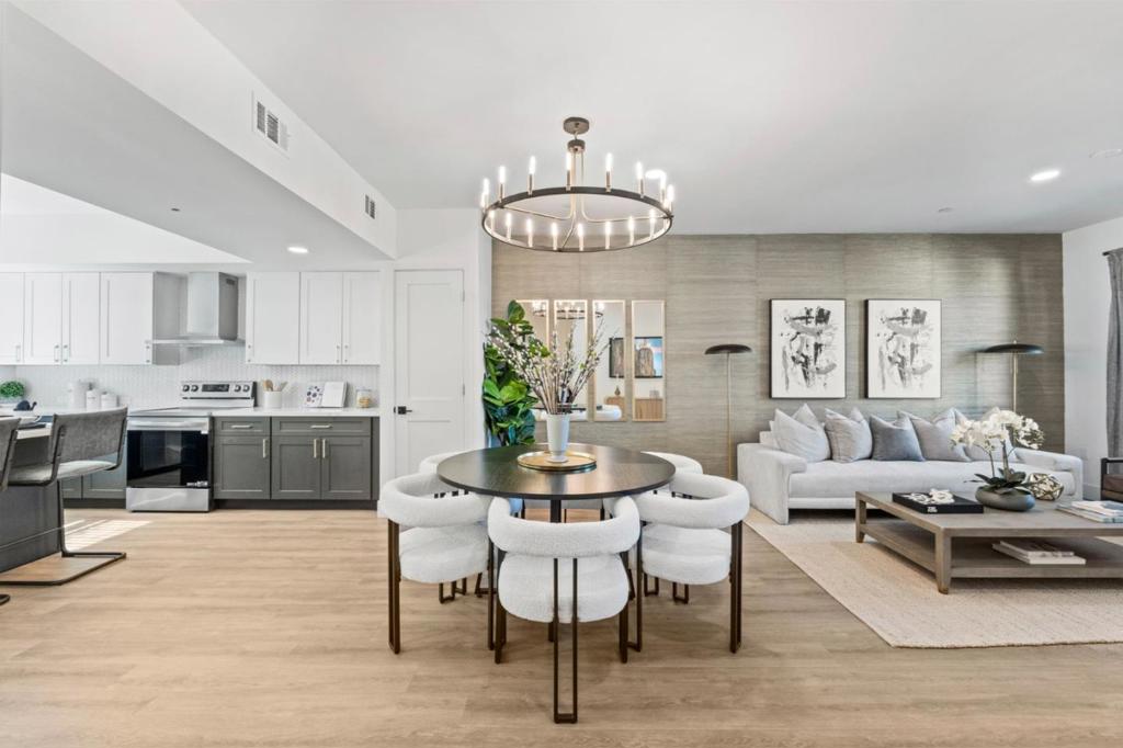 Experience the pinnacle of modern living in this newly built three-level townhome, nestled in the vibrant heart of Sunnyvale. Offering 3 bedrooms, 3.5 baths, and a versatile bonus room (could be a 4th bedroom), this home effortlessly combines luxury, sustainability, and functionality. The main living area boasts a sleek chefs kitchen with white shaker cabinets, quartz countertops, stainless steel appliances, and a central island with a breakfast bar, seamlessly flowing into open-concept living and dining spaces enhanced by two decks for indoor/outdoor enjoyment (on some units). The top level features a luxurious primary suite with a walk-in closet, spa-inspired bath, private deck, and convenient access to two additional bedrooms and a laundry area. A private rooftop patio crowns this stunning residence, offering breathtaking views and the perfect space for entertaining or unwinding under the stars. Additional highlights include a first-level bonus room with a full bath, Solar, a 2-car garage with an EV charger, and proximity to Sunnyvale parks, restaurants, downtown amenities, and major tech employers. This is Silicon Valley living at its finest! GPS - use 475 N Fair Oaks