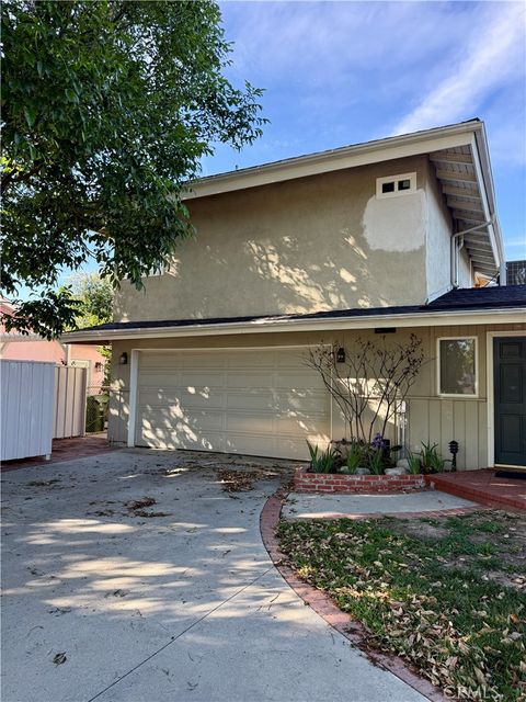 Photo of 20407 Strathern St #20411, Winnetka, CA 91306 (MLS # GD26045780)
