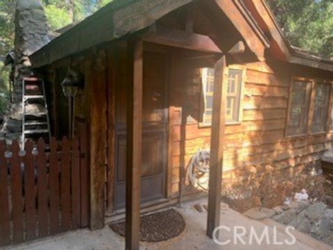 Photo of 402 Burnt Mill Canyon Road, Cedarpines Park, CA 92322 (MLS # CV26044710)