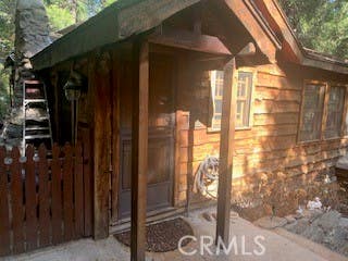 Photo of 402 Burnt Mill Canyon Road, Cedarpines Park, CA 92322 (MLS # CV26044710)