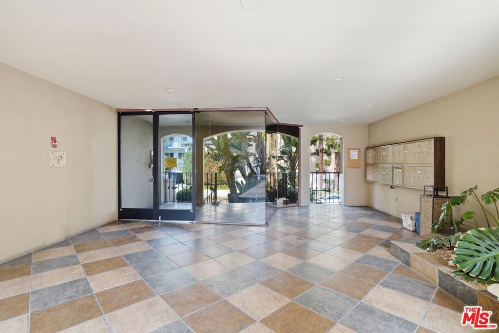 Photo of 11646 Chenault Street #19, Los Angeles, CA 90049 (MLS # 26660297)
