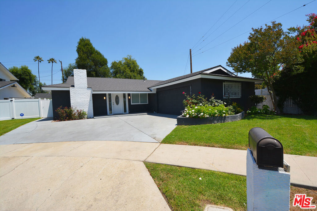 This beautifully updated 4 bed/ 3 bath lovely home is located in one of the most desirable neighborhoods in Woodland Hills. Home featuring, new cool roof, new 5-ton HVAC with new ducting, new fiberglass insulation, new vinyl floors, new 200W electric panel, new fence, new sprinkler system, fresh paint inside & outside, upgraded kitchen with granite counters, custom cabinets. Custom-built entertainment center in the living room. Bonus room that can be used as a gym, office, or storage.Beautifully tiled huge backyard with covered patio and built-in siting area with gas flamed fire table, wet bar with granite top, and BBQ that provides great outdoor living space. Lots of exterior lighting. This is an entertainers' paradise. Many fruit trees (guava, peach, fig, lemon & lime). Nearby schools are Hale, Lockhurst & El Camino High. Close to the Topanga mall, The Village, Fallbrook mall, Restaurants, shopping, and public transportation. Garage converted to additional ADU or mother-in-law quarters. Hurry, it will not last!
