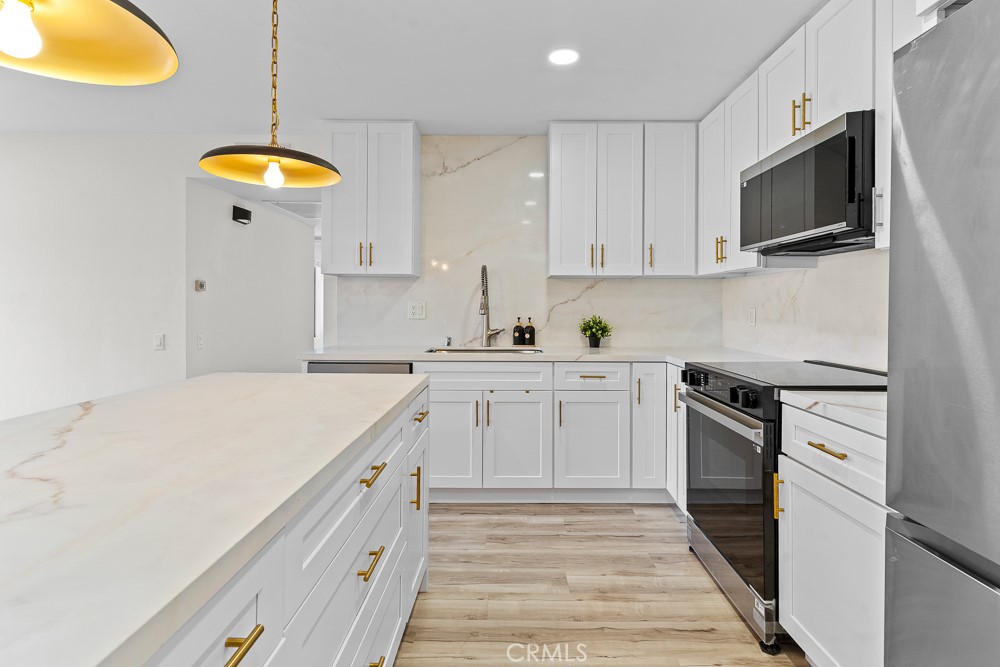 21921 Rimhurst Dr. 128-F