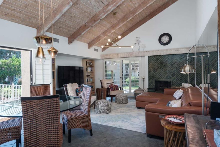 Fabulous location in Mission Hills Country Club.This one-bedroom, two bath condominium would be a great investment, vacation home or a full time residence. The condo has been totally updated featuring stainless appliances, marble countertops and stunning lighting throughout.  You will find a bright and airy living room with soaring wood beamed ceilings and fireplace with gorgeous herringbone pattern tile surround.  The guest bath has a custom shower which extends use for your guests.  There are custom shutters at all windows and sliding doors.  Enjoy outdoor living on the large fenced private patio.The views are magnificent looking out on the lake with panoramic viewing area.  Pride ofownership shines in this sought after tennis villa.The land lease is being extended to 2121 whichadds long term value.  The detached 2-car garage is just steps away. This condo is a mustsee and not one to miss.OPEN HOUSE - Saturday, December 6, 2025Noon - 2 PM