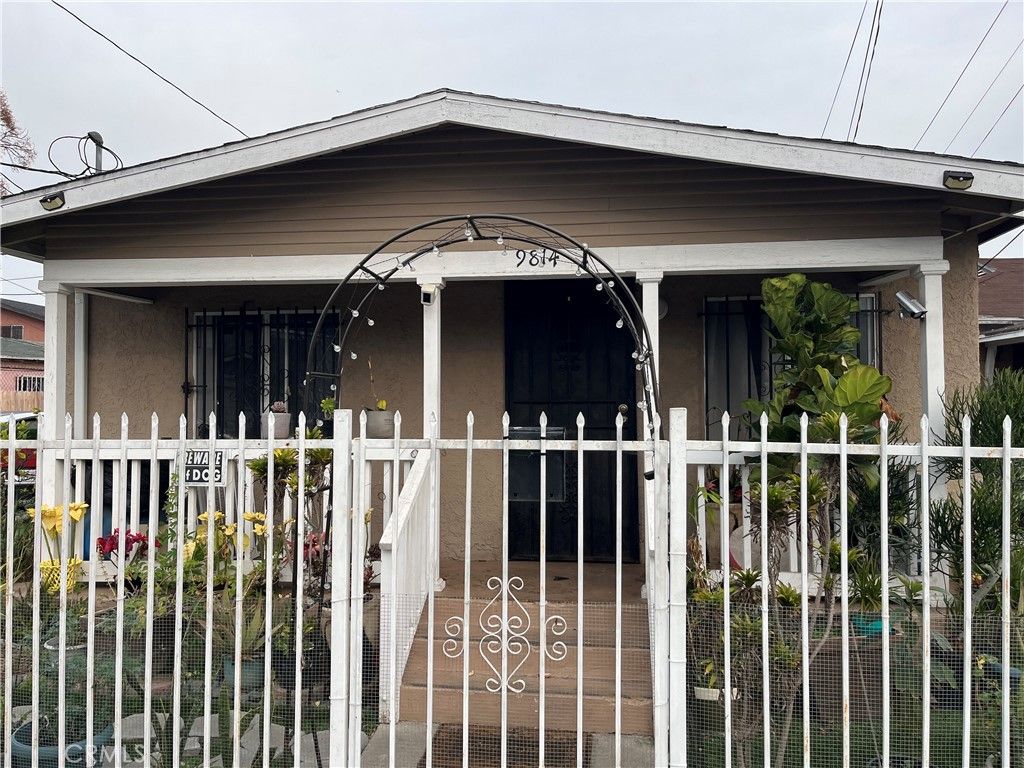 Photo of 9814 Bandera, Los Angeles, CA 90002 (MLS # DW26015354)