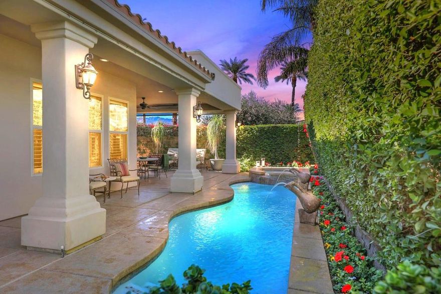 Gorgeous Tuscany inspired home built in 2005 on prime corner lot in fabulous, gated community of Montelena in the heart of Indian Wells. Beautiful home boasts 2991 square feet, high ceilings, neutral tiled floors, plantation shutters, 3 Bedrooms, 3 ensuite Baths, Powder bath, spacious formal and informal Dining room, plus Home Office. Elegant gated and pavered front Courtyard with impressive Rotunda entry. Stunning open Great Room awaits with granite fireplace and mirrored wet bar with glass shelves and granite countertops. Outstanding Gourmet Kitchen adjoins featuring big island with bar seating, granite countertops, full stone backsplash and stove hood, high-end stainless appliances includes new dishwasher, wine cooler, and walk-in pantry. Home office and Primary Bedroom have new luxury vinyl wood floors which adds such warmth to the home. Large Primary Bath has travertine countertops, dual sinks plus large vanity area, soak tub, big shower, and huge walk-in custom closet. Guest Bedrooms are carpeted and feature walk-in closets. The very private and lovely landscaped backyard has a large, covered patio highlighting the glistening pool/ spa and water features. Enjoy this remarkable home with special benefits and a private walkway to the Tommy Bahamas Miramonte hotel next door.