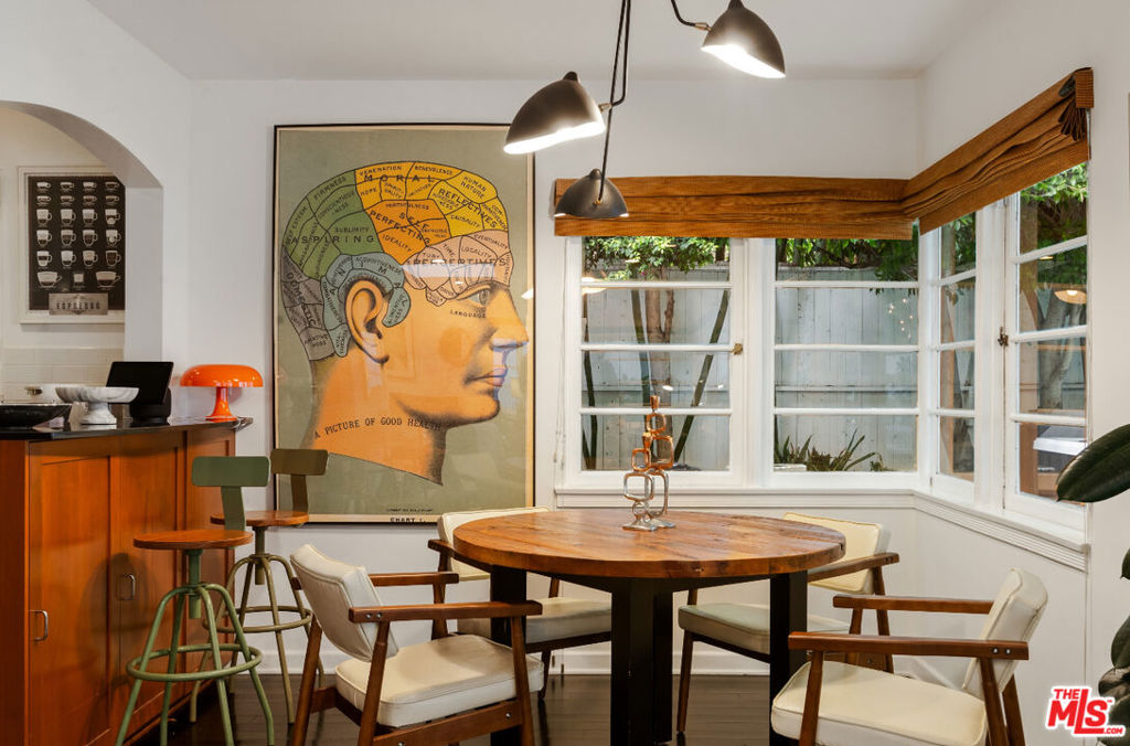 This rare and recently refreshed 1937 Streamline Moderne 3BR/2BA "mini compound" is located in the heart of West Hollywood. Features include hardwood floors throughout, one bedroom downstairs, two bedrooms upstairs, and a large and bright living room with skylight, original corner windows and cozy gas-burning fireplace with glass tile mantle. The all-stainless kitchen with granite countertops opens to the dining area. The downstairs bedroom can also be used as an office/media room.Additional features include a newly installed JACUZZI, two spacious upstairs bedrooms with a full hallway bath, and a master bedroom with private roof-deck access. There is a fully drywalled two-car garage with storage and keyless doorway access that can be used as is or as flex space.The property also features NEST thermostat & cam/doorbell, a security system, gated driveway access off the alley with space for two full size cars tandem, and a mature ficus-surrounded back yard with a brick patio, perfect for entertaining or just relaxing under the stars.Located within walking distance of Melrose Place, Nobu, Alfred Coffee & Croft Alley. AVAILABLE FOR SHORT-TERM, MONTH-TO-MONTH, PLEASE INQUIRE RATE.