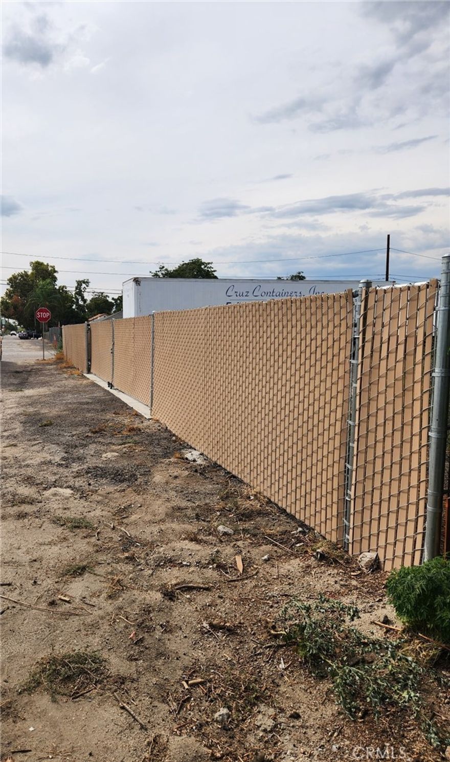 This vacant land presents a rare opportunity to establish or expand your industrial footprint in one of San Bernardino’s most sought-after industrial corridors. Fully gated and secured, the property offers peace of mind and added value for business operations. The lot has already been completely flattened and prepared for immediate use, saving you both time and resources. Permits are already in process with the city, and the current owner has successfully completed phase one—investing over $7,000 to bring the property closer to readiness.

If you are looking for a ready-to-use industrial lot with the groundwork already done, this is the one.

Key Features:

Size & Configuration: A substantial 8,700 sq. ft. corner lot, providing a versatile and well-designed canvas for a wide range of industrial uses.

Fully Prepared: Lot has been flattened, gated, and secured—ready for your next project.

Permits & Phase One Complete: Permits already in progress with the city, with phase one finalized and $7,000 invested by the seller.

Prime Location: Ideally situated in the heart of San Bernardino, between Santa Fe Avenue and Gifford Street, within a thriving industrial hub.

Excellent Accessibility: Convenient access to major transportation routes and logistics centers, including nearby freeways [insert relevant highways], ensuring efficient connectivity for operations and distribution.

Zoning Advantage: Zoned for industrial use, providing flexibility for various business models.

Corner Lot Benefit: Enhanced visibility, multiple access points, and strategic frontage ideal for exposure and functionality.

This property offers a unique blend of location, security, and readiness—making it an outstanding opportunity for any business looking to grow within San Bernardino’s dynamic industrial market.