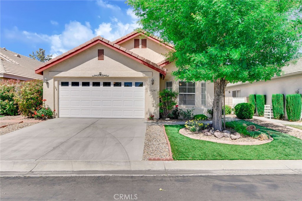 Charming 2-Bed, 2-Bath Home in the 55+ Wyndham Rose Community – Apple Valley ***Newer Flooring***
Welcome to 11247 Pleasant Hills Drive, a beautifully maintained home located in the highly desirable 55+ community of Wyndham Rose in Apple Valley. This spacious 1,497 sq ft residence offers two generously sized master suites, perfect for comfortable and private living.
Step inside to a large open living room filled with natural light—ideal for both relaxing and entertaining. The well-appointed kitchen flows seamlessly into the dining area, and the entire home is surrounded by beautifully landscaped grounds that create a peaceful outdoor setting.
Conveniently located just minutes from Jess Ranch Marketplace, you’ll enjoy easy access to Target, Best Buy, WinCo, restaurants, fitness centers, and more. Whether you’re downsizing or seeking a quiet, convenient lifestyle, this home offers the perfect blend of comfort, community, and accessibility.
Don’t miss this opportunity to live in one of Apple Valley’s most welcoming and well-kept senior communities!