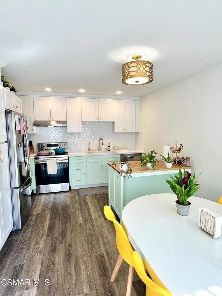 3 bedroom, 1.5 bath townhouse in desirable Oakbrook community. Great location at the end. Owner upgraded almost everything in 2021 - completely renovated kitchen and bathrooms - lovely, modern and bright, new HVAC and Nest A/C installed. Kitchen has upgraded soft-close cabinets & drawers, pull-out shelves in pantry, clean white countertop, sink and backsplash, stainless steel appliances (newer stove and dishwasher included). Beautiful high-quality laminate flooring throughout, new light fixtures, and great natural light throughout. Indoor laundry area, newer full-sized washer/dryer included. Lovely large patio. 2 parking spaces, one covered and one open. Convenient to community pool, spa, playground, shopping and schools (Lang Ranch Elementary, Los Cerritos Middle School, Westlake HS). Near shopping, parks/trails and easy access to the 101 and 23 freeways! Owner pays HOA and trash only.