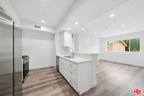 Photo of 627 N Dillon Street #206, Los Angeles, CA 90026 (MLS # 26104024)