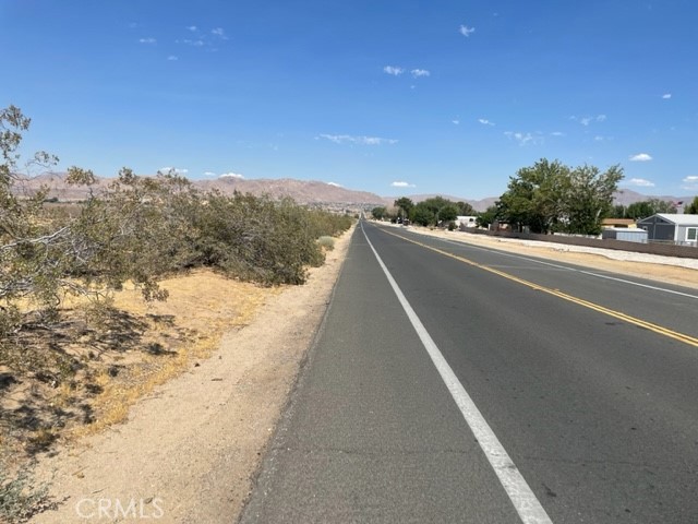 Nice level buildable lot. Perfect location views of the desert and the surrounding foothills. Close to utilities, structure just on the west side of property.
