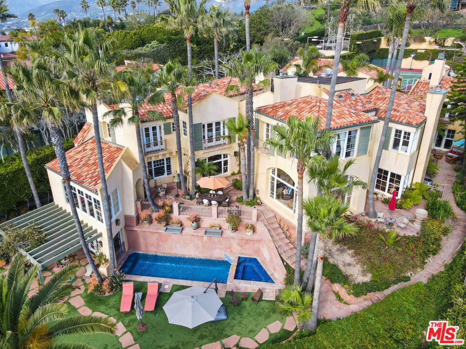 Incredible Lease! BLUFF ESTATE ON POINT DUME: This incredible property has it all; Panoramic Ocean Views, steps to Beach, lighted Tennis, Basketball & Pickleball Court, Pool & Spa plus TWO Guest Houses. Enter through impressive wooden security gates through a lushly landscaped entry with circular motor-Court. A stone path leads to a magnificent glass & wood front door. Interior features include a formal dining room, a sky lighted living room with massive fireplace and 18 foot ceilings, a gourmet kitchen with informal dining & sitting room overlooking the Pool, Spa and gardens for the ultimate in indoor/outdoor entertaining. All Bedrooms in the main house are "en suite" and have whitewater views. The square footage does not include the two guest houses. This property has Private stairs to Westward Beach. AVAILABLE July 12. Price change reflects the summer rate.