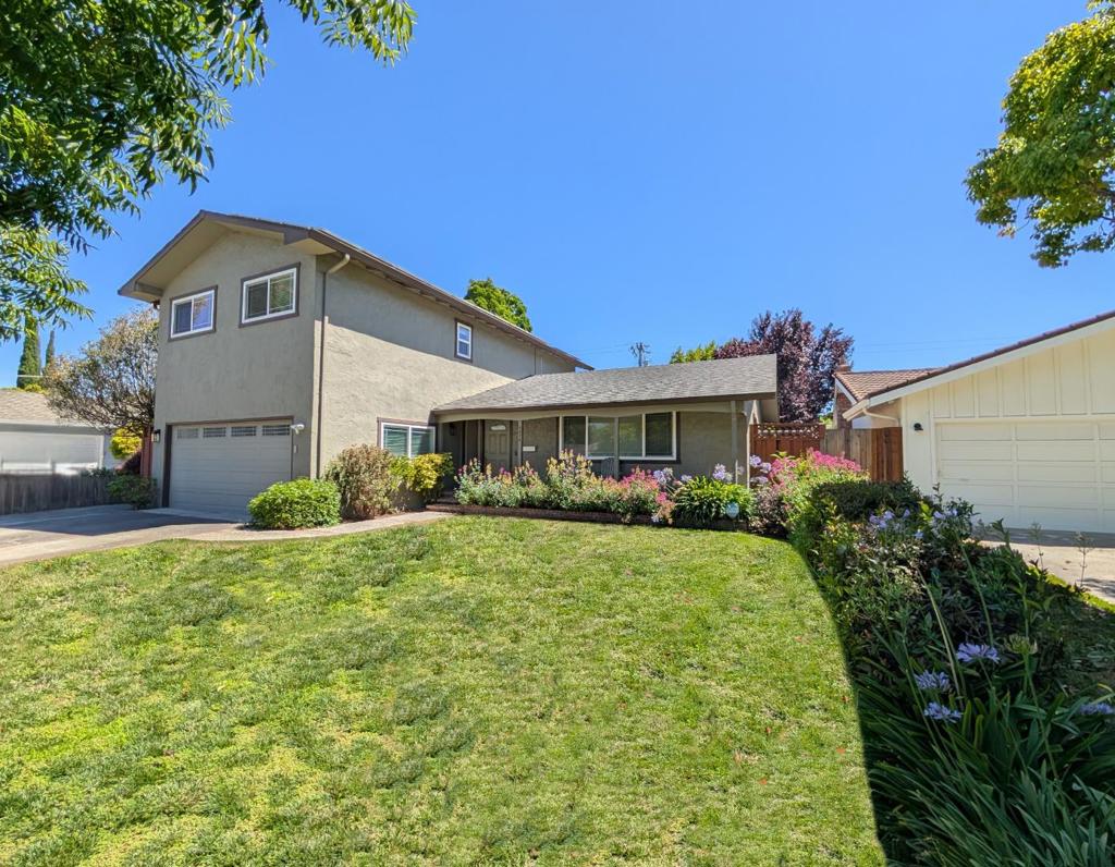 Beautifully Remodeled home minutes from Downtown Campbell. Over $300k documented in upgrades, etc over the years. Gorgeous open kitchen w/granite counters & full backsplash, giant quartz island seats 6-8, stainless steel appliances, soft close cabinetry, pull out shelves. LR/DR/FR. Separate family room offers additional living space or transform into a guest suite w/ direct access to a new full bathroom. Bonus ~250sf (not counted in sqft) finished sunroom is a versatile space w/ access to an entertainers backyard. Peaceful Primary suite w/giant Elfa custom closets, recessed lights, ceiling fan & a beautifully remodeled en-suite w/ quartz vanity, custom tile shower, & stylish finishes. Two spacious secondary bedrooms & remodeled upstairs hall bathroom w/designer touches. Backyard oasis includes paver patio, pergola w/retractable shade, & covered outdoor kitchen w/granite bar, sink, & power, turf, retaining wall, & smart irrigation system. EV charger installed w/permit, recessed lighting, crown molding, dual-pane windows, Ring security cameras/system, A/C, FULLY PAID solar grandfathered into a valuable utility plan, refinished birch hardwood, updated oak staircase, excellent location near LG Creek Trail, Whole Foods, restaurants, shopping, entertainment & commute routes