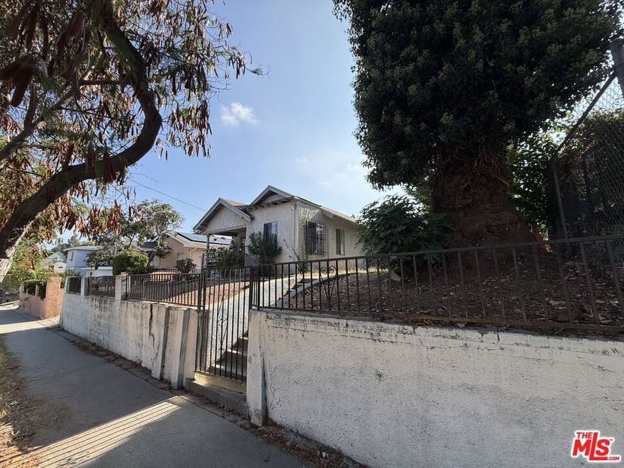 Situated on a beautiful tree-lined street in one of Highland Park's most desirable pockets, this 8,400 SF lot (approx. 60' x 140') is a rare development site with RD1.5 zoning. The property currently features two existing residential units, offering immediate income potential while you plan your project.  Zoning and lot configuration offer a range of paths to redevelopment, including construction of multiple by-right units in the large rear yard, addition of ADUs, or a larger ground-up housing development. Centrally located near vibrant York Blvd and Figueroa Street corridors, the property enjoys easy access to shops, cafes, schools, and major freeways. This is an ideal site for investors, developers, or owner-users looking to capitalize on Highland Park's strong demand for quality housing and continued neighborhood growth.