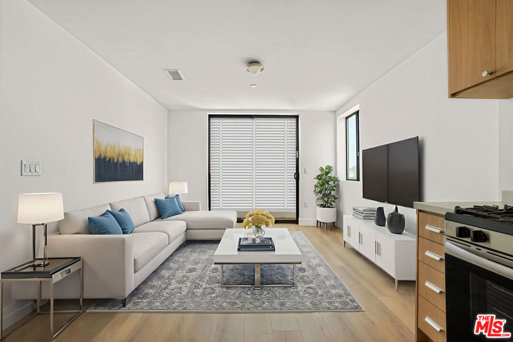 Discover elevated urban living in Westwood's newest modern apartment community. Perfectly tailored for professionals, students, and families, this brand-new construction 16 unit complex blends modern style with comfort and functionality. Be the first resident! Apartment 603 is rear-facing and is one of the most desirable units in the property. It features a 2 bedroom/2 bathroom open concept layout and is equipped with new stainless steel appliances, in-unit laundry, and central air and heat. Perhaps its most alluring quality, however, is the early morning light the rises over the panoramic city views - a wonderful setting to wake up to. Enjoy the ease of secure underground parking and working remotely from the rooftop deck. 1822 Overland is centrally located to major employment, freeways, and points of interest alike. Residents will enjoy the short 1.5 mile or less proximity to the UCLA campus, Century City Mall, the 405 freeway, and the upcoming Metro Purple Line extension stops at Wilshire/Gayley and Constellation/Avenue of the Stars. Don't miss this opportunity your new luxury lifestyle awaits!