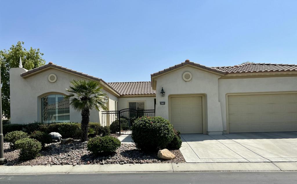 Welcome to this stunning San Miguel floor plan, beautifully finished and situated on a quiet corner privacy lot in the coveted gated community of Sun City Shadow Hills. This gem features a private pool, spa with waterfall feature, and built-in BBQ island and serving bar -- the perfect setting for year-round desert living. This 2,569 SF home with two private suites feels elegant and has been exceptionally maintained. Inside, elegant tile and plush carpet pair with custom window coverings, designer accent walls, and soaring ceilings with recessed lights and ceiling fans to create a warm, inviting atmosphere. The open layout offers multiple spaces for both entertaining and everyday living, including a formal dining area, spacious family room, and a versatile den with double door entry. This spacious kitchen has granite countertops, a center island, and two ovens perfect for entertaining. The primary suite offers patio access, dual vanities, an oval soaking tub, a glass-enclosed shower, and an oversized walk-in closet. The second suite features its own private entrance and full bath, providing comfort and privacy for guests. Additional features include a two-car plus golf cart garage, spacious laundry room with ample storage, and a newer A/C. Residents of Sun City Shadow Hills enjoy resort-style amenities including two clubhouses with fitness centers, pools, tennis, pickleball, bocce, golf courses, walking trails, on-site dining, and over 60 social clubs. With 24-hour gated security and a vibrant calendar of activities, it's the perfect place to stay active and connected year-round.