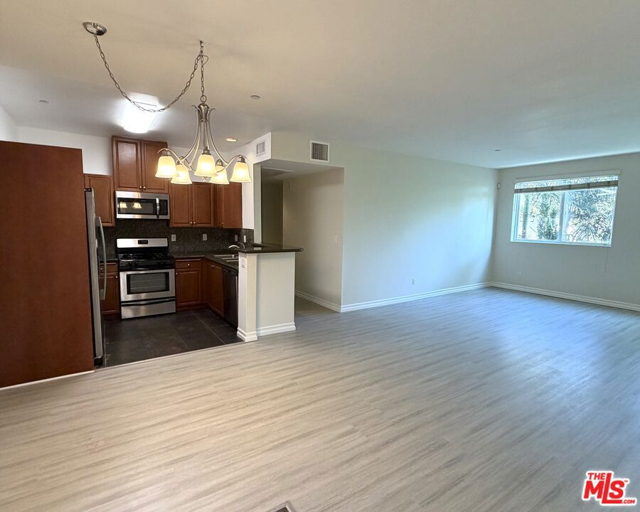 13941 Sherman Way 201