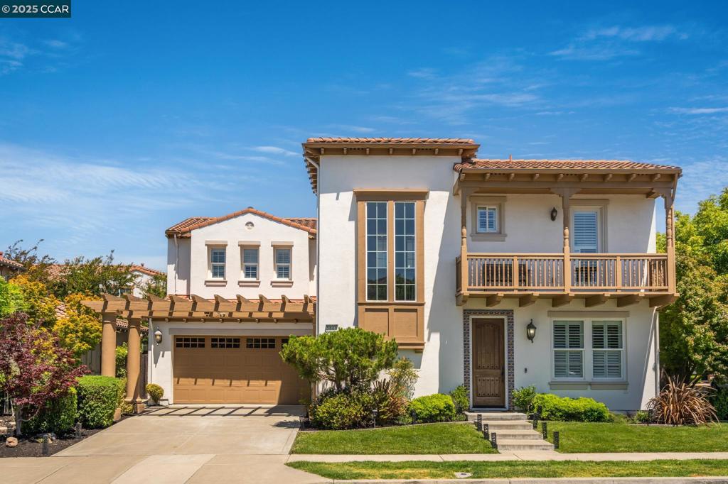 Situated on a corner lot in the highly sought-after Gale Ranch community of San Ramon, this spacious single-family home offers a prime location and a functional, desirable floorplan. Beautifully maintained, it features new and stylish light fixtures, gleaming hardwood floors, a formal living room, formal dining room, and an oversized kitchen/family room combo ideal for everyday living and entertaining. The kitchen highlights freshly painted cabinetry, built-in stainless steel appliances—including a refrigerator, oven, microwave, cooktop, and dishwasher—a large island with bar seating, and a cozy dining nook with built-in cabinetry for added storage. A main-level bonus retreat can be converted into a 5th bedroom. Upstairs, discover the large primary bedroom suite with 2 walk-in closets, an additional retreat and access to a spacious balcony—offering your very own luxurious and relaxing sanctuary. Two bedrooms share a Jack & Jill bath, while a third has a private ensuite. The low-maintenance backyard features spacious patios, a fruit-bearing pomelo tree, and grapevines. Enjoy walking distance to Mosaic Park, Bark & Ride Dog Park, and Quail Run Elementary, with a short drive to top-rated San Ramon Valley schools and premier shopping/dining at City Center.