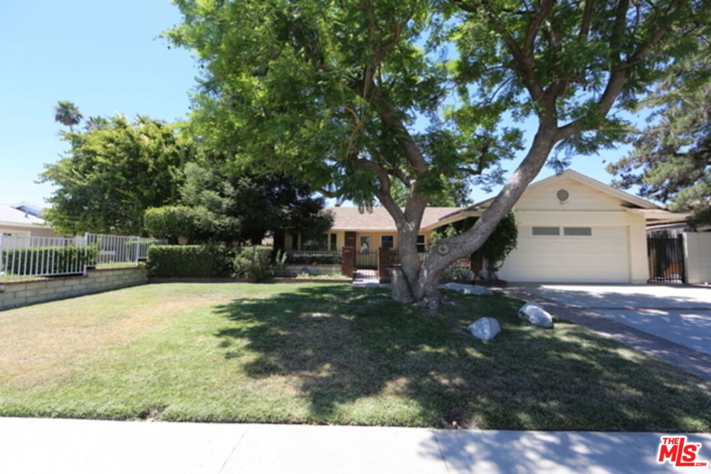 A Gem of a home in a serene very nice area. 4 bedrooms or 4th could be used as an office. Laundry next to the kitchen and the shared bathroom. Master bedroom has its own bathroom. Added next to kitchen a big famly room with high ceilings and built in shelving. A good size 2 car garage plus driveway parking. the kitchen nice, plenty of drawers and cabinets plus the home overall has been well cared for.