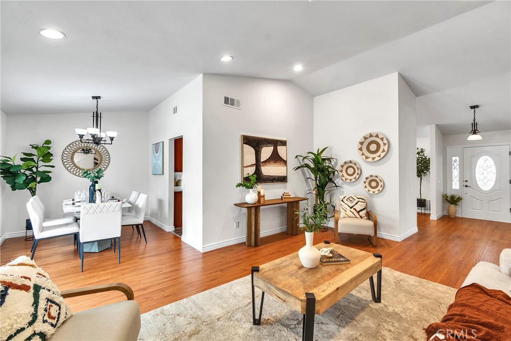Welcome to 22511 Eddridge Dr, Diamond Bar, CA 91765 — a beautifully maintained single-story home tucked away on a quiet cul-de-sac, offering both privacy and comfort. This residence features 4 bedrooms and 2 bathrooms across approximately 1,600 sq ft on a generous 8,700+ sq ft lot. The interior highlights a remodeled kitchen with abundant storage and a peninsula island overlooking the family room, a cozy fireplace in the living room with sliding door access to the spacious backyard, and a master suite with walk-in closet, dual sinks, and its own sliding door to the yard. The living room opens seamlessly to the dining area, creating a natural flow for entertaining. Additional upgrades include double pane windows, newer kitchen and bathrooms, and a paid-off solar system. High ceilings in the living and family rooms add to the open feel, while the south-facing orientation keeps the home naturally cool. Exterior features include a low-maintenance front yard, fruit trees in the backyard, and an attached 2-car garage. With its spacious lot, the home also offers ADU/JADU potential for multi-generational living or rental income. Located within walking distance to Maple Hill Elementary and served by the highly rated Walnut Valley Unified School District, with easy access to shopping, dining, and the 57/60 freeways.